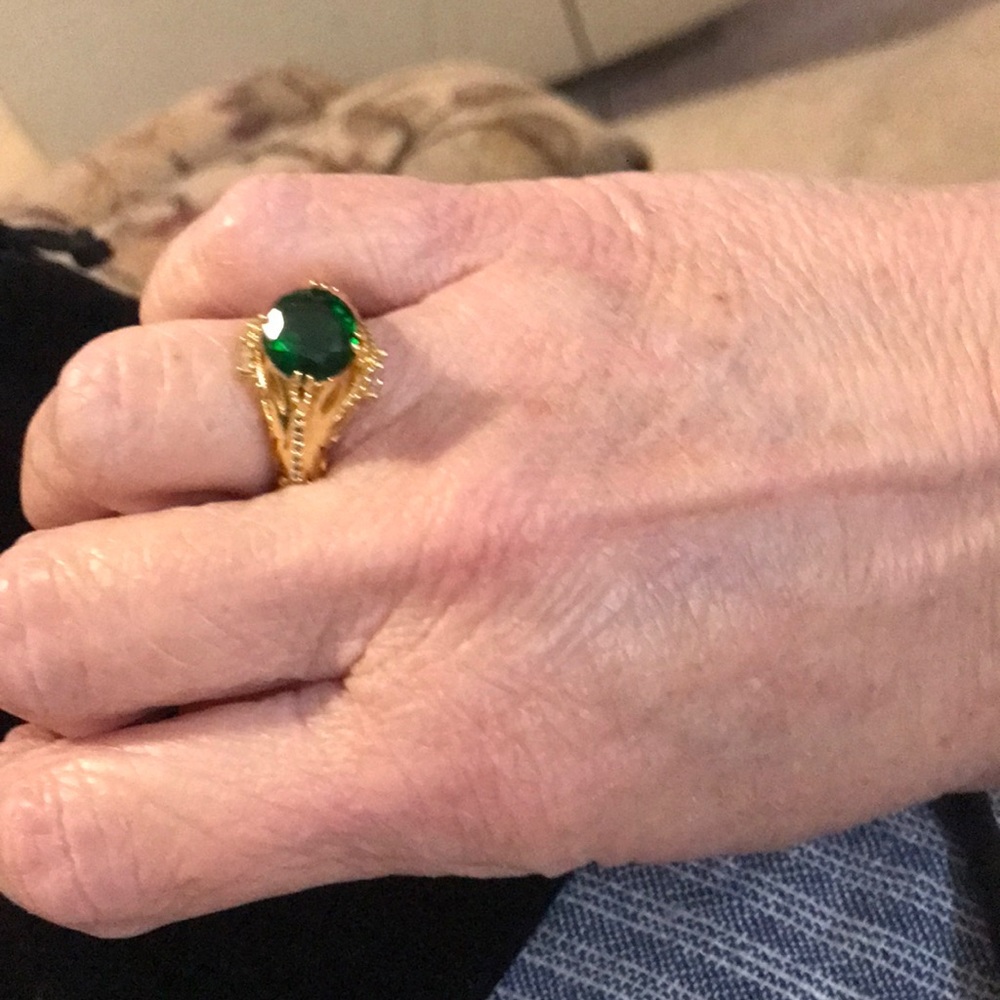 Green colored stone ring.